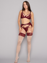 brunette girl wearing burgundy red lace suspender belt 